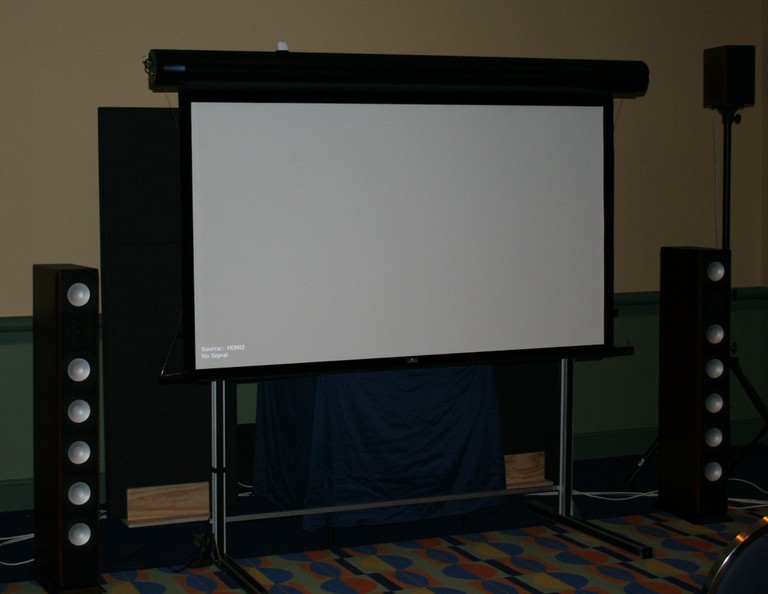 Seymour AV accoustically transparent Center Stage screen in action